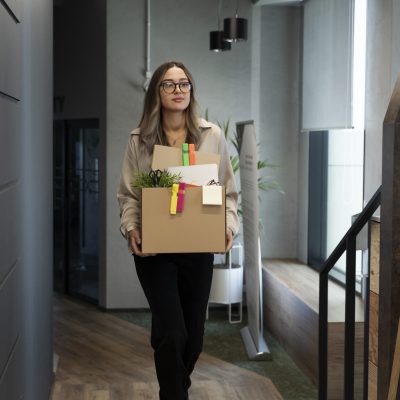 full-shot-woman-holding-cardboard-box
